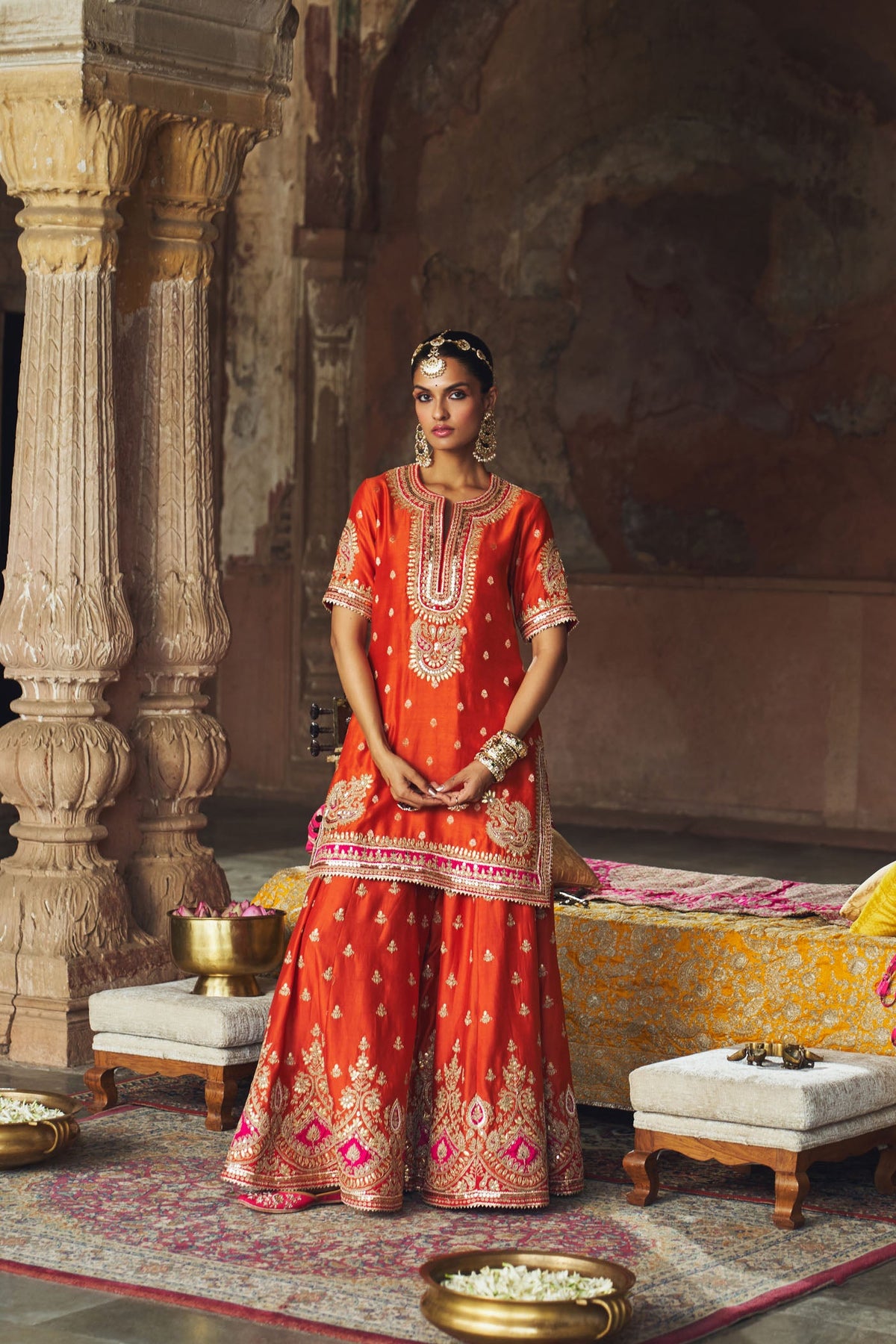 ANJALI KHUSHALANI IN AREESHA - BURNT ORANGE SHORT KURTA WITH SHARARA AND DUPATTA