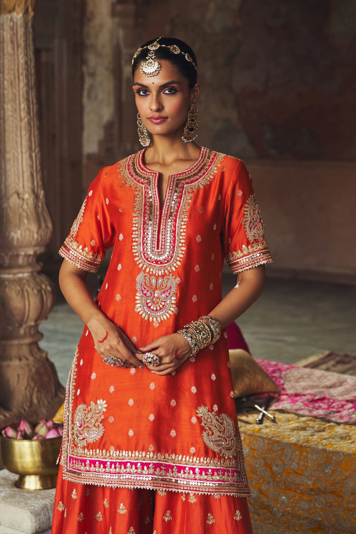 ANJALI KHUSHALANI IN AREESHA - BURNT ORANGE SHORT KURTA WITH SHARARA AND DUPATTA