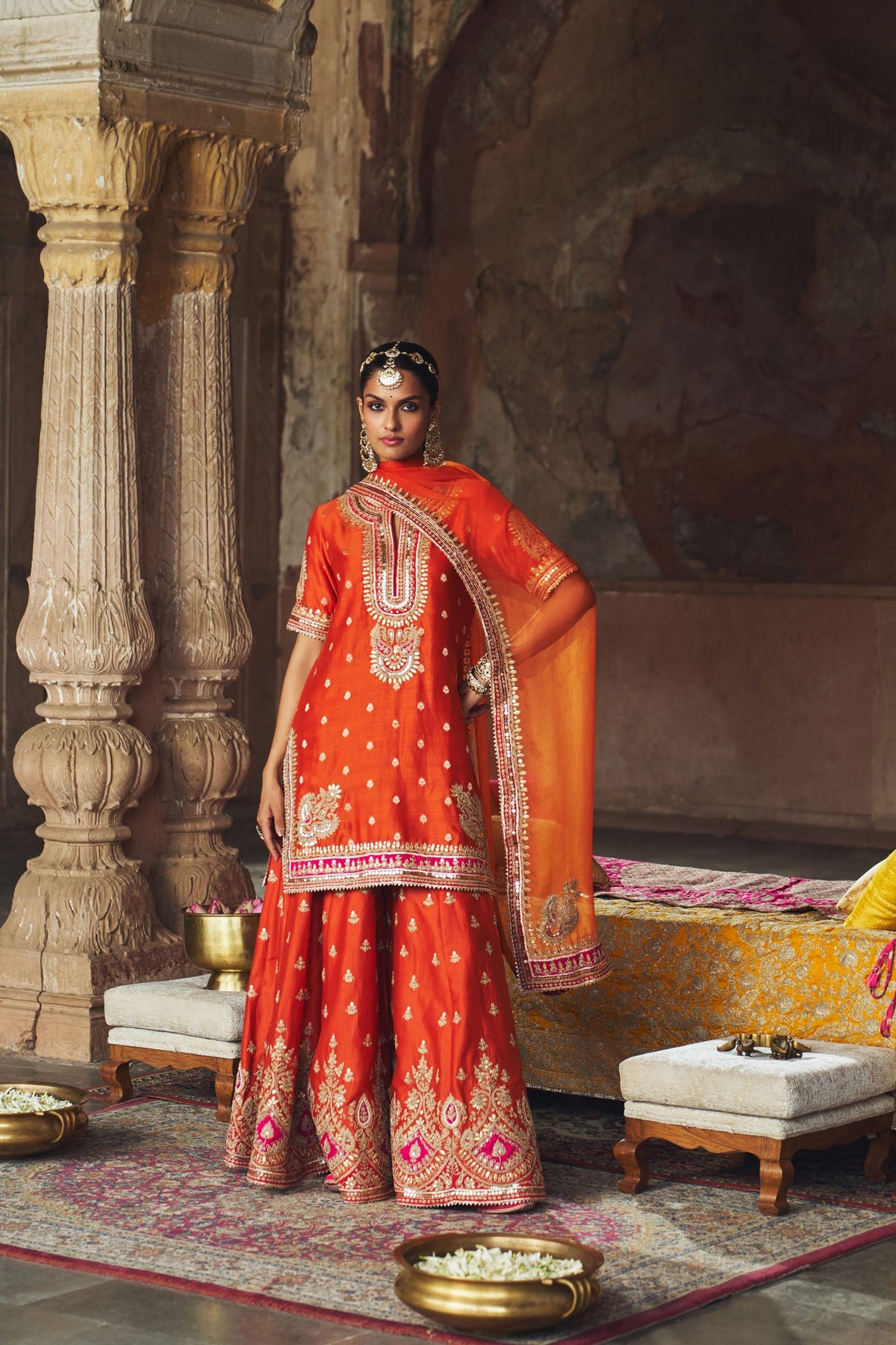 ANJALI KHUSHALANI IN AREESHA - BURNT ORANGE SHORT KURTA WITH SHARARA AND DUPATTA