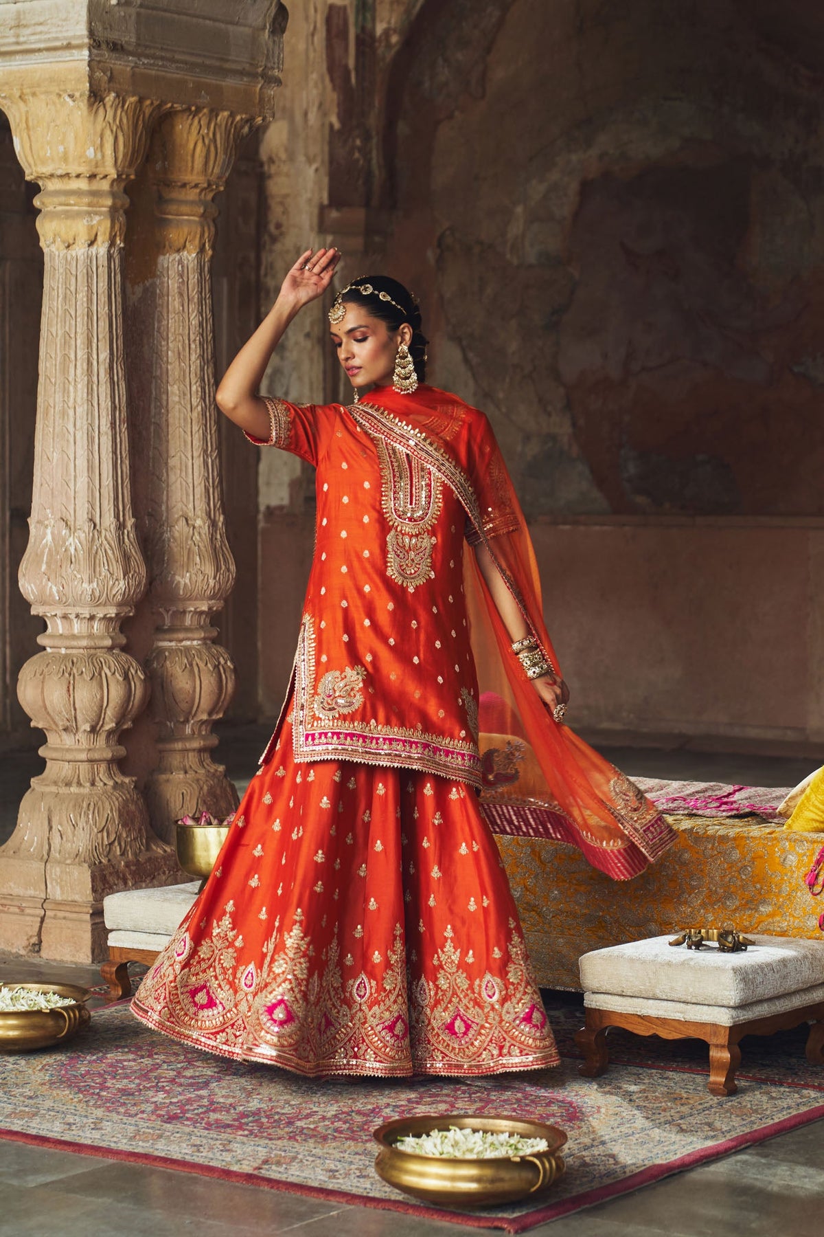 ANJALI KHUSHALANI IN AREESHA - BURNT ORANGE SHORT KURTA WITH SHARARA AND DUPATTA