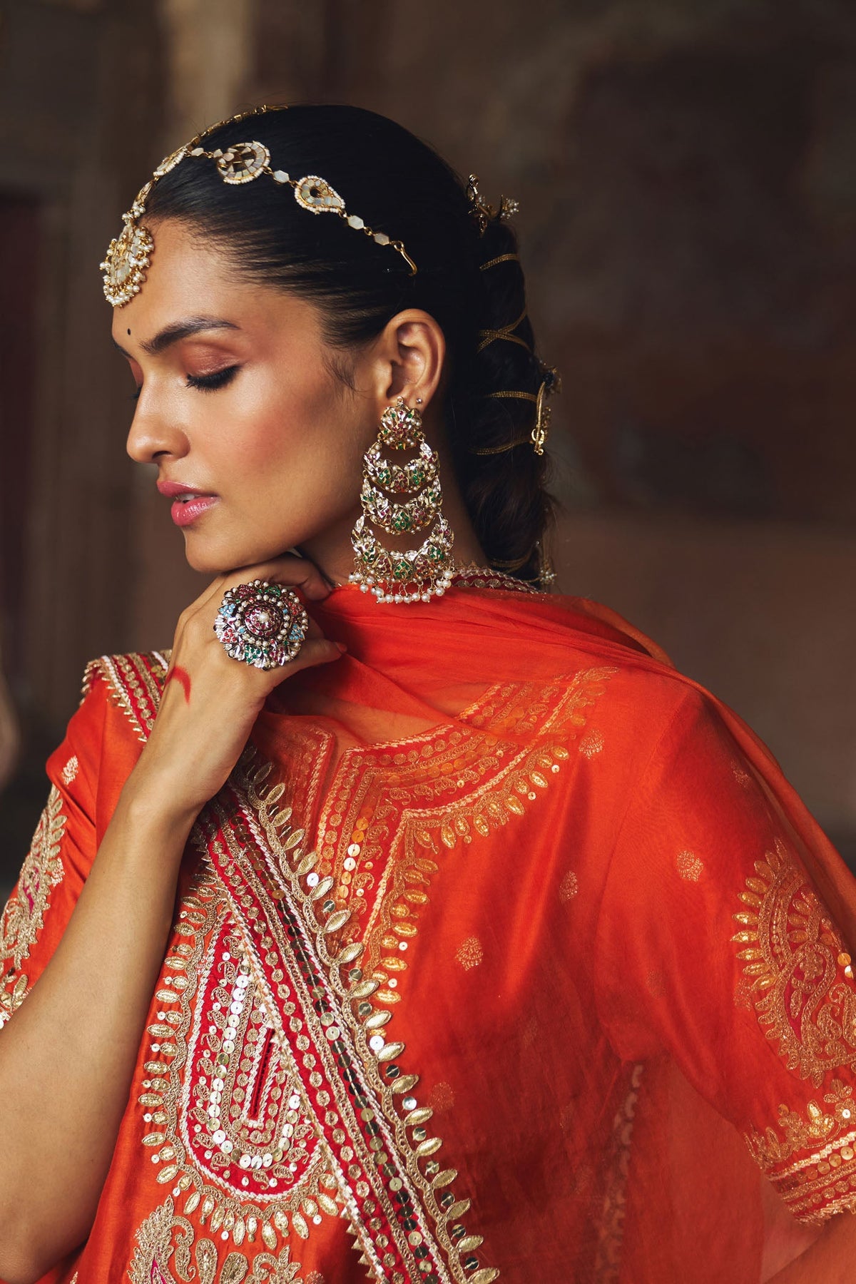 ANJALI KHUSHALANI IN AREESHA - BURNT ORANGE SHORT KURTA WITH SHARARA AND DUPATTA